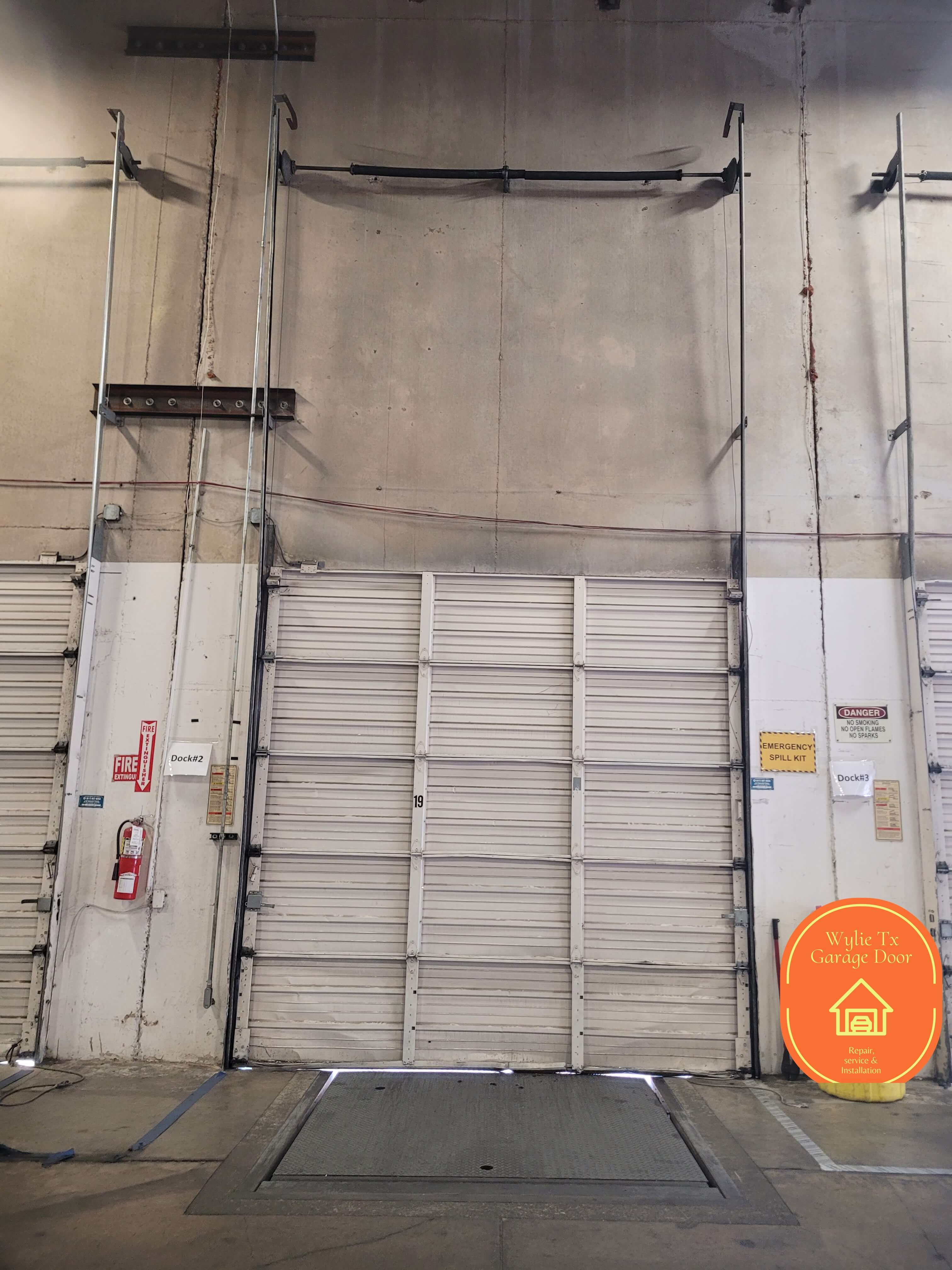 commercial-vertical-tracks-garage-door-repair